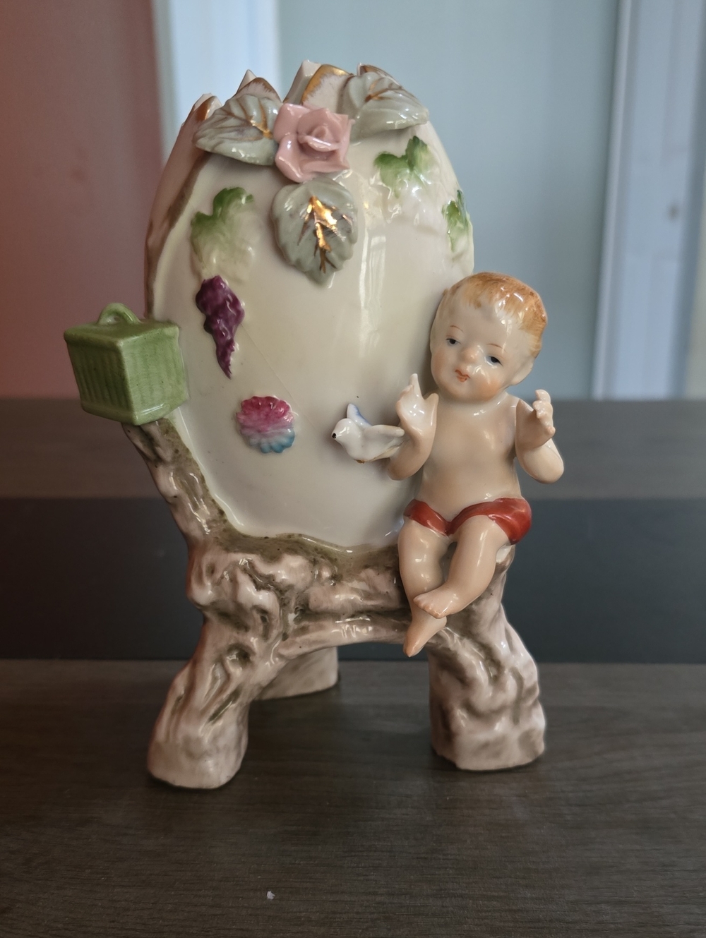 Porcelain Cherub Egg Figurine with Pink Rose and Red Accents